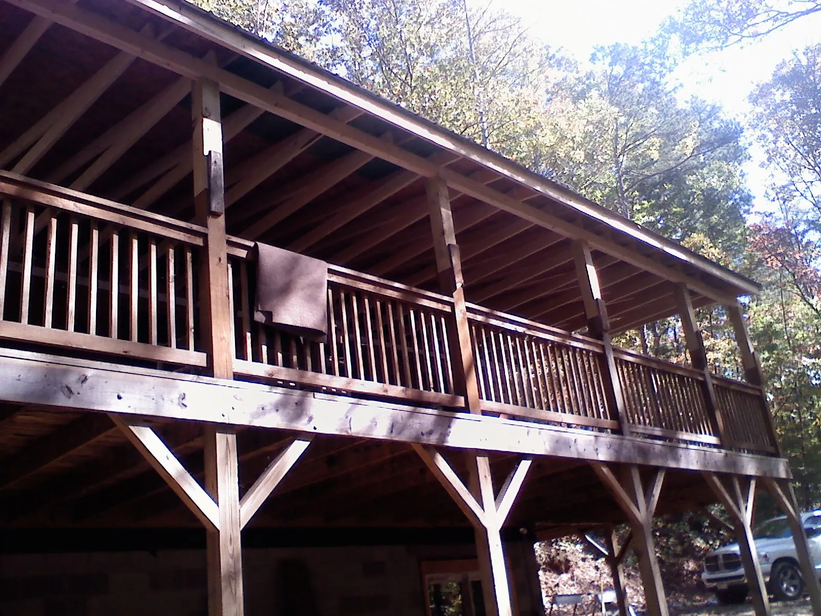 Timber framing under a new elevated porch and deck — Roof Leak Repair in Clemons by Roofing Brothers